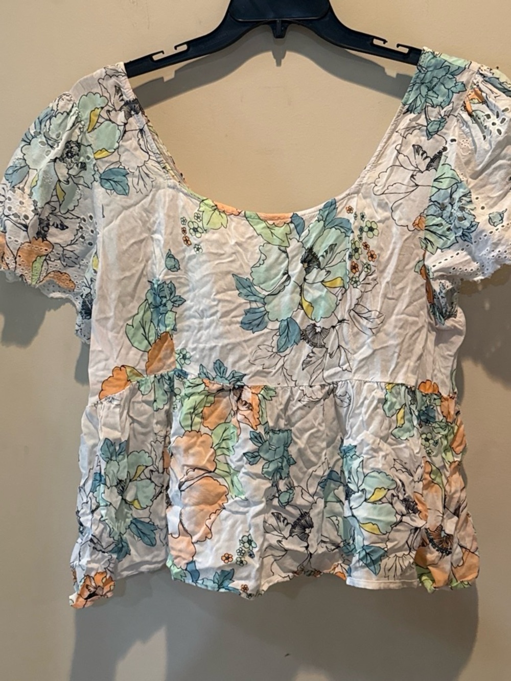 Wonderly White Floral Peplum Top with Pastel Blue and Peach Accents